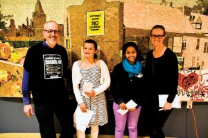 PHOTO COURTESY RICHARD?LONGLEY/HVRA: Harbord Village Residents’ Association (HVRA) chair Tim Grant, contest winners Maya Retzleff and Liya Tadesse, and HVRA’s essay contest coordinator Paula Gallo pose at the association’s spring meeting.