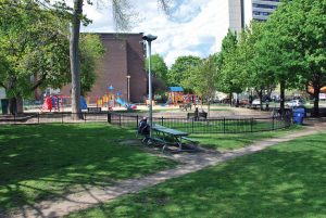 PHOTO BY EMILY REA: The fenced in playground, and large number of equipment, makes Huron and Washington Park a perfect destination for families.