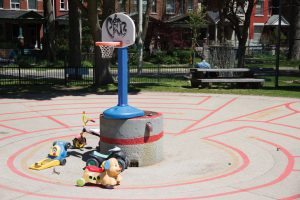 PHOTO BY GEREMY BORDONARO: Nestled in a thriving neighbourhood, Margaret Fairley Park has a popular wading pool feature with a small labyrinth mural.